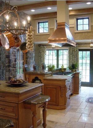 beautiful kitchen with a range hood