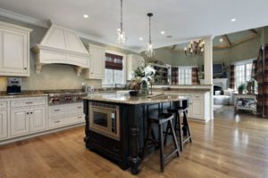 kitchen in luxury home with white cabinetry