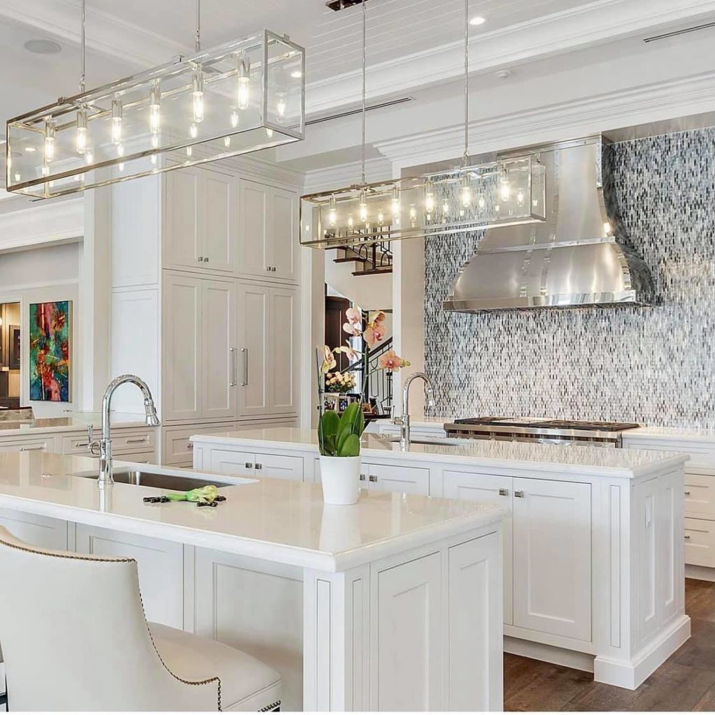 beautiful kitchen with stainless steel hood