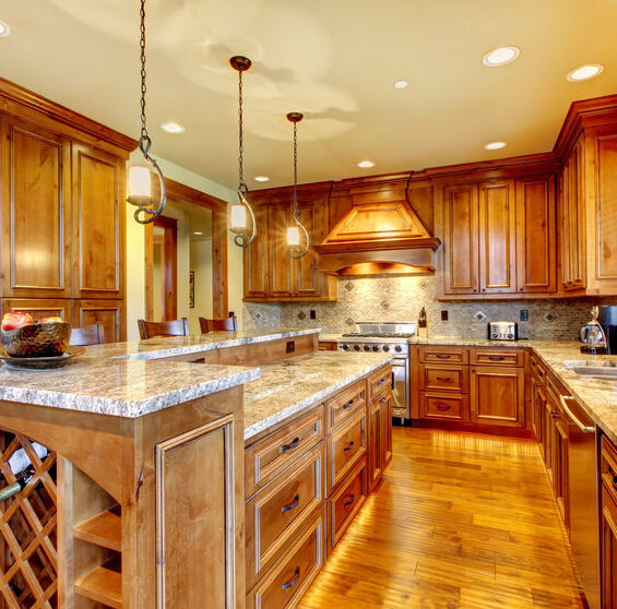 Brilliant kitchen with stained wood cabinets and hardwood floor.